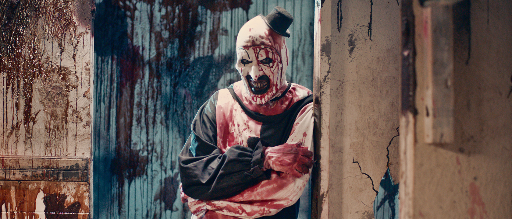 Art the Clown in a blood-streaked Fright Factory corridor